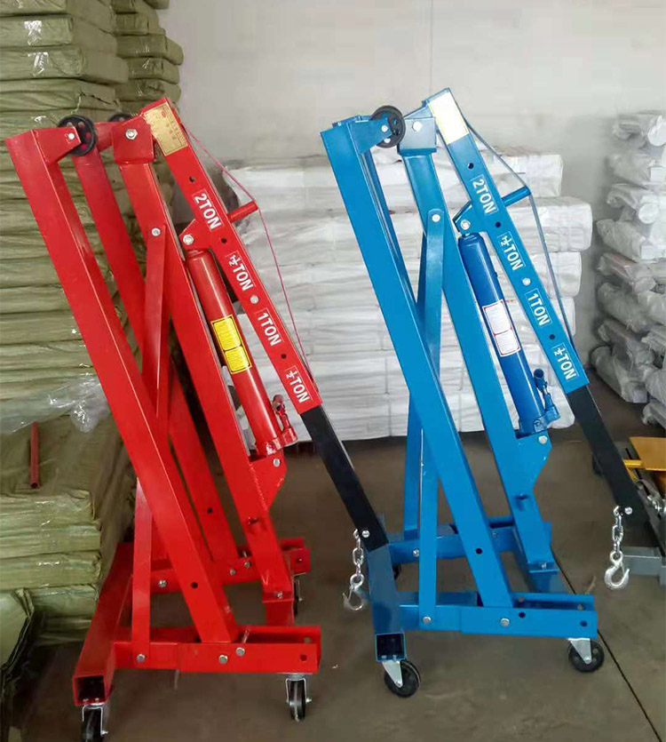 Folding hydraulic engine crane
